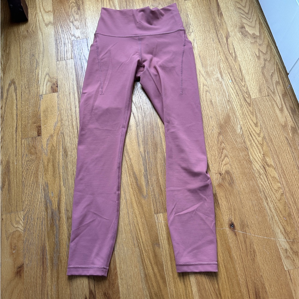 LULULEMON pocketed aligns - never worn - size 4 - 25”
